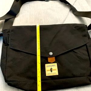 Cotopaxi medium satchel new with tags. 10 x 14 x 2.5”.